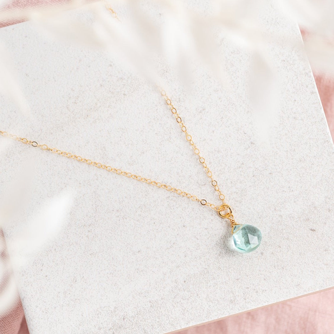 Gold necklace deals with aquamarine stone